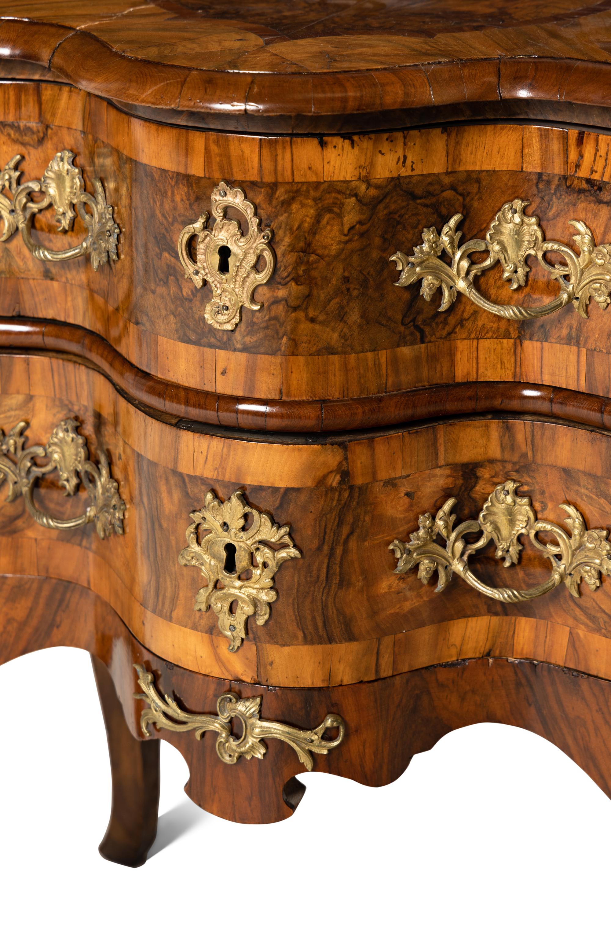A Pair of Continental Gilt Metal Mounted Burlwood Commodes