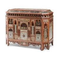 A Moorish Style Marquetry and Mother-of-Pearl Inlaid Lift Top Chest