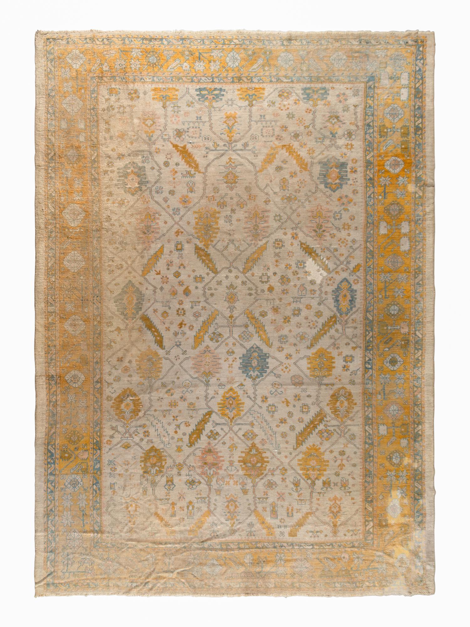 An Oushak Wool Rug