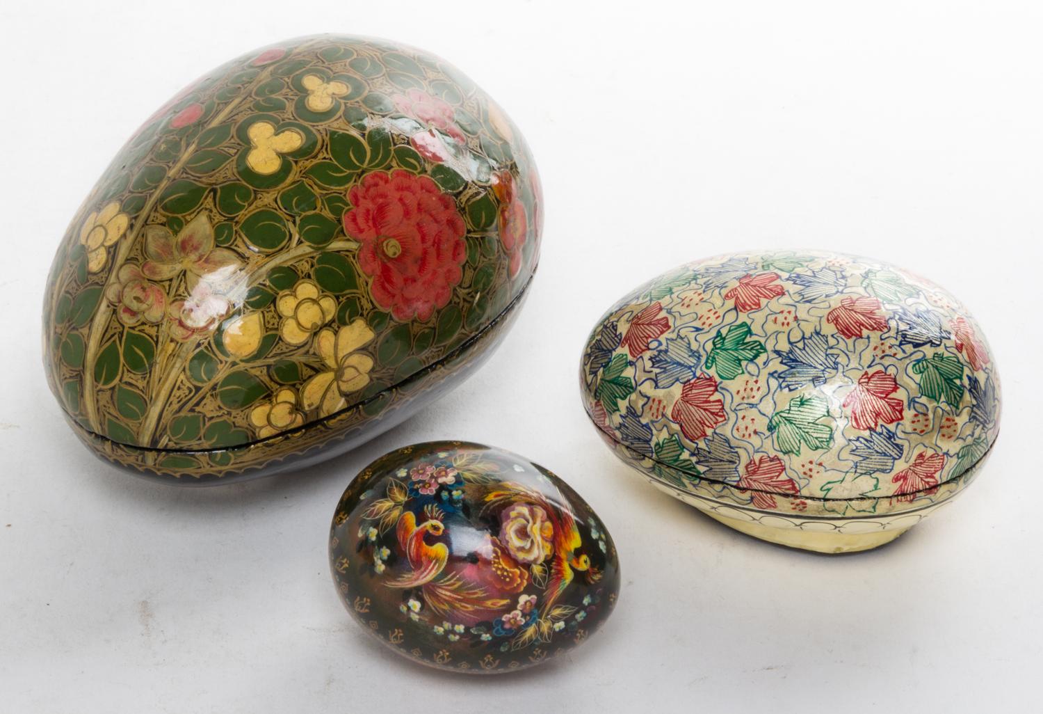 Three Lacquered Eggs Length of largest 5 3/8 inches. — 20TH CENTURY