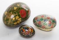 Three Lacquered Eggs Length of largest 5 3/8 inches. — 20TH CENTURY
