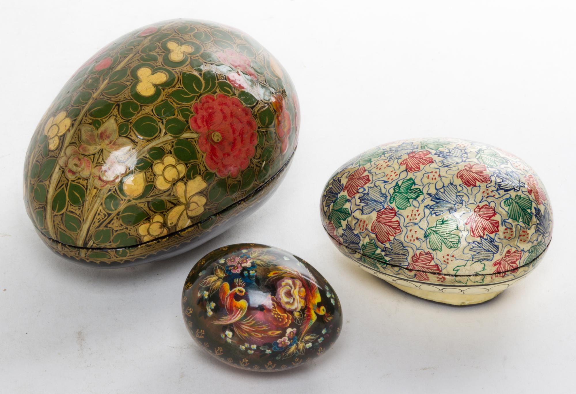 Three Lacquered Eggs Length of largest 5 3/8 inches. — 20TH CENTURY