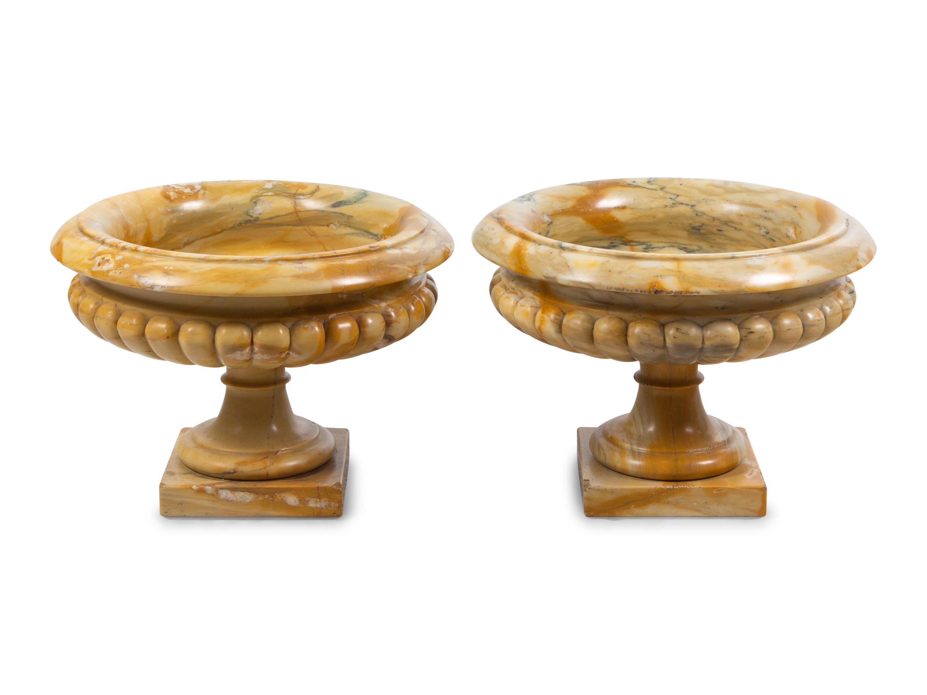 A Pair of Neoclassical Style Marble Urns