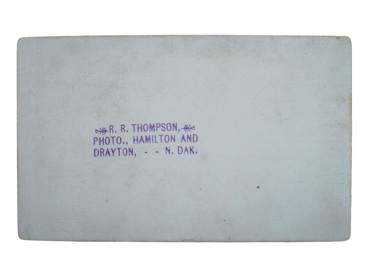 [EARLY PHOTOGRAPHY]. THOMPSON, R.R., photographer. Postmortem CDV of an infant. Drayton, ND.
