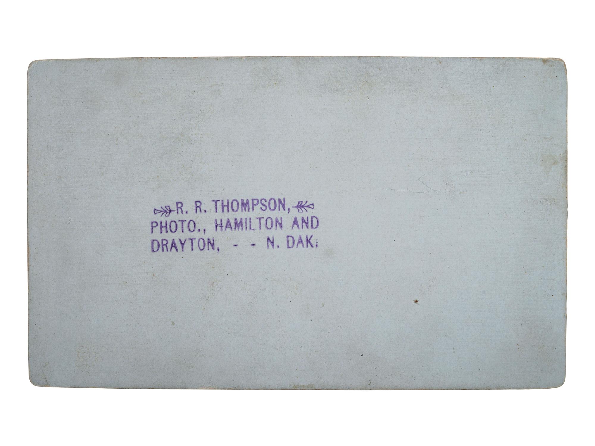 [EARLY PHOTOGRAPHY]. THOMPSON, R.R., photographer. Postmortem CDV of an infant. Drayton, ND.