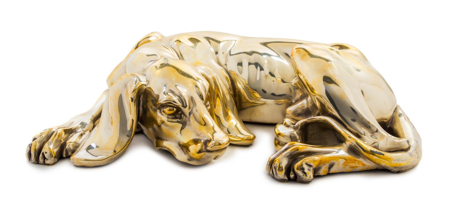 A Silvered Metal Figure Width 17 inches.