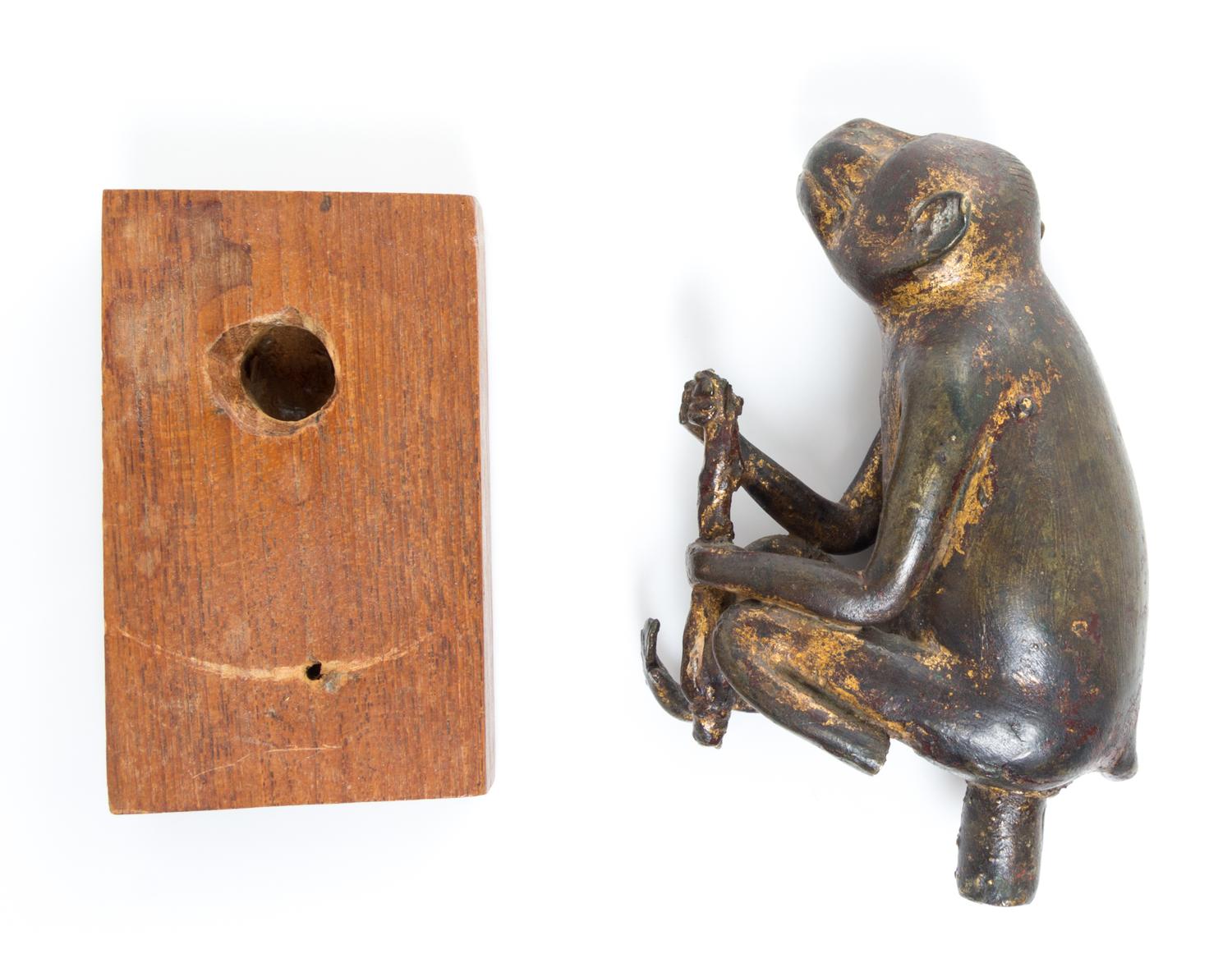 A Japanese Bronze Figure of a Monkey Height overall 5 1/2 inches.