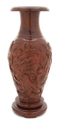 An Asian Carved Hardwood Baluster-form Vase Height 15 3/4 inches — 20TH CENTURY