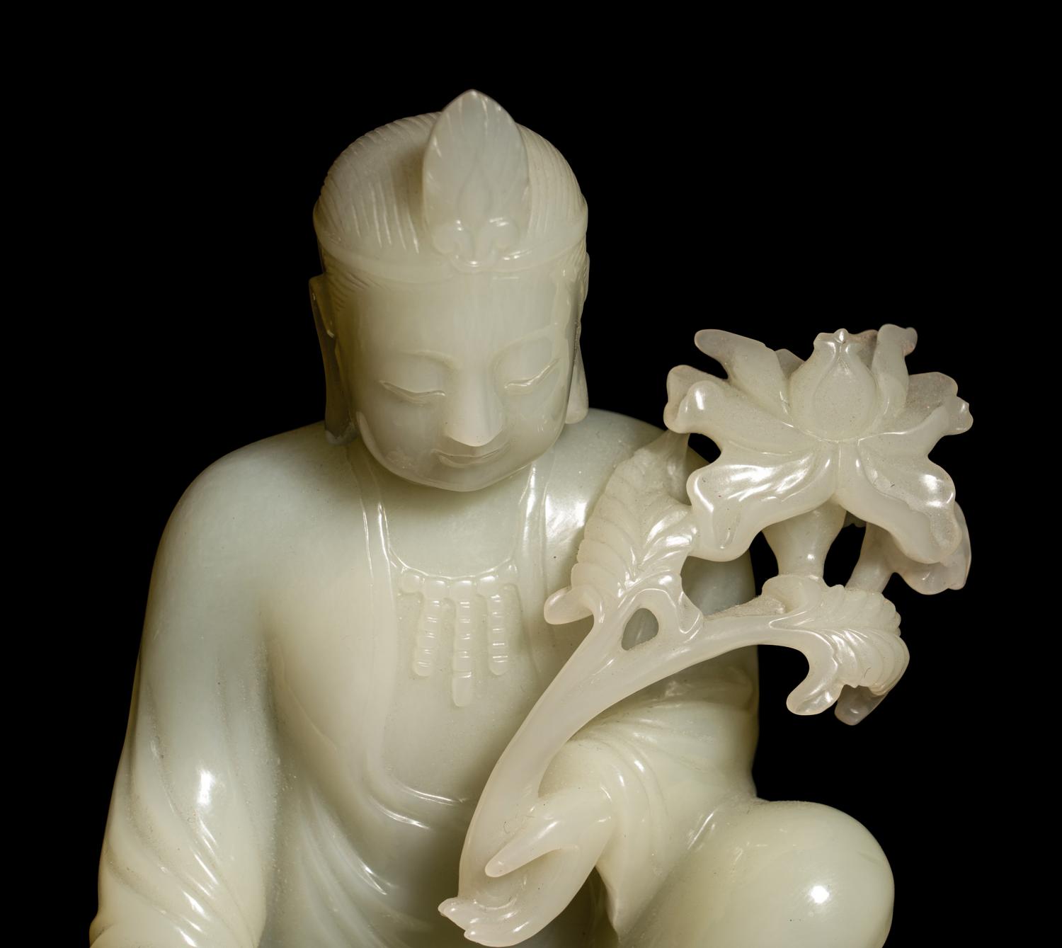 A Pale Celadon Jade Figure of Guanyin