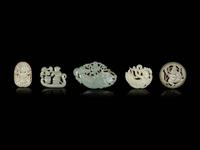 Five Chinese Celadon Jade Reticulated Figural Pendants