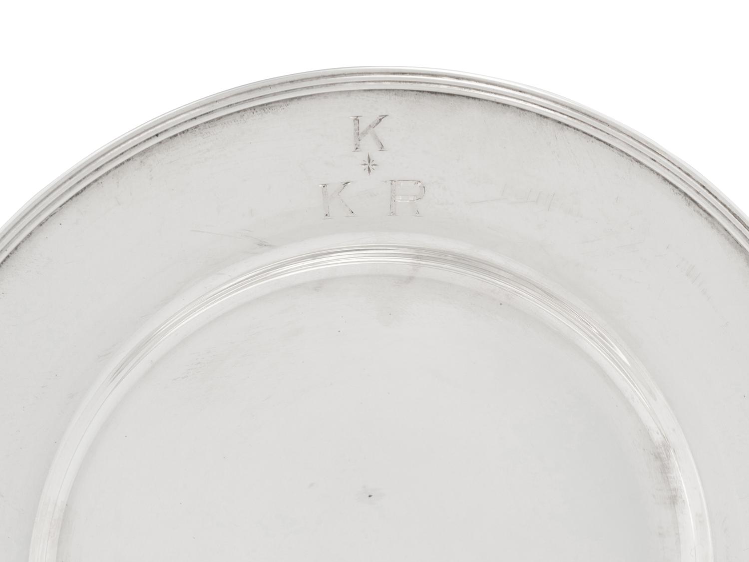 A Set of Eighteen American Silver Bread Plates