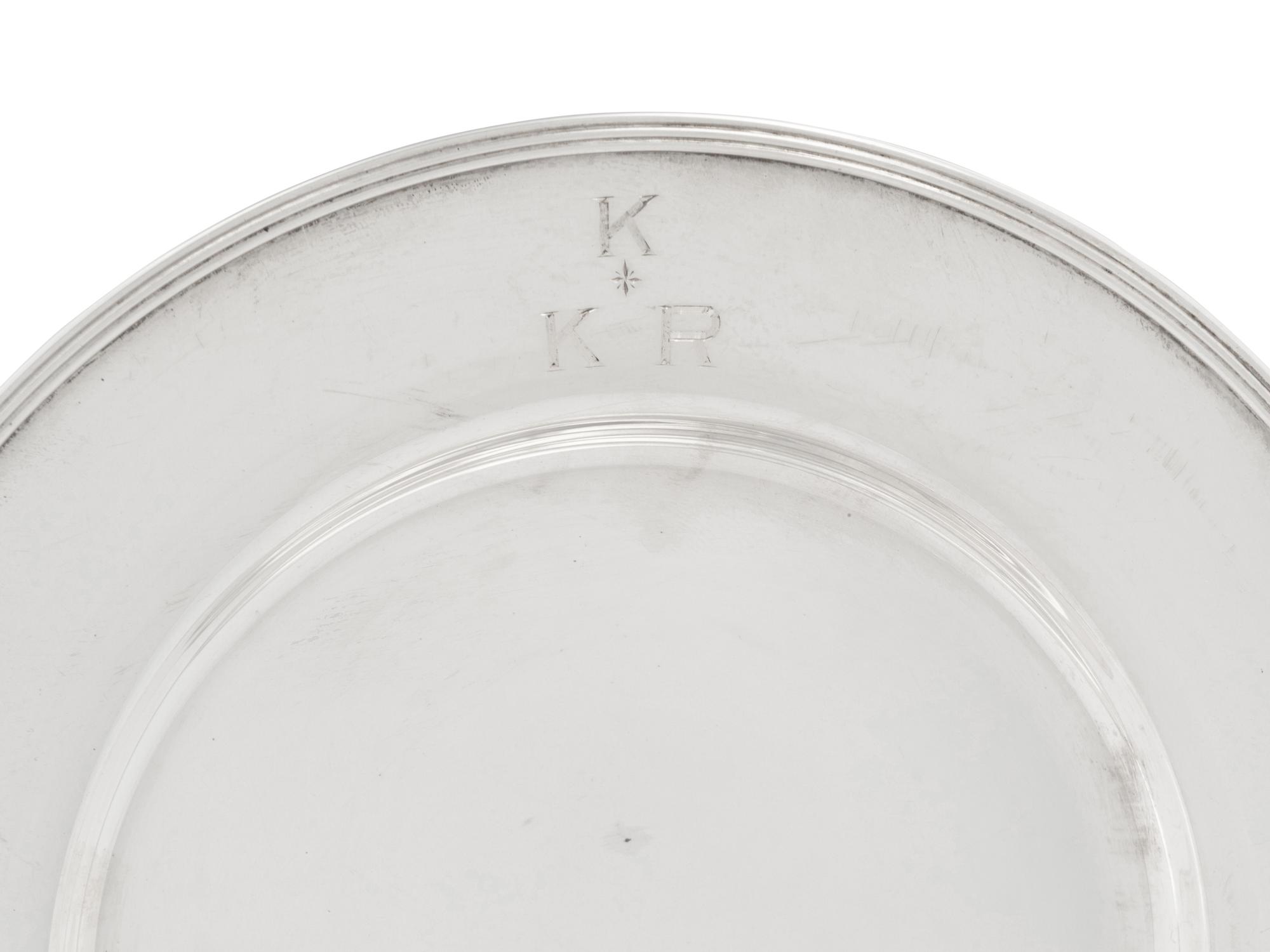 A Set of Eighteen American Silver Bread Plates