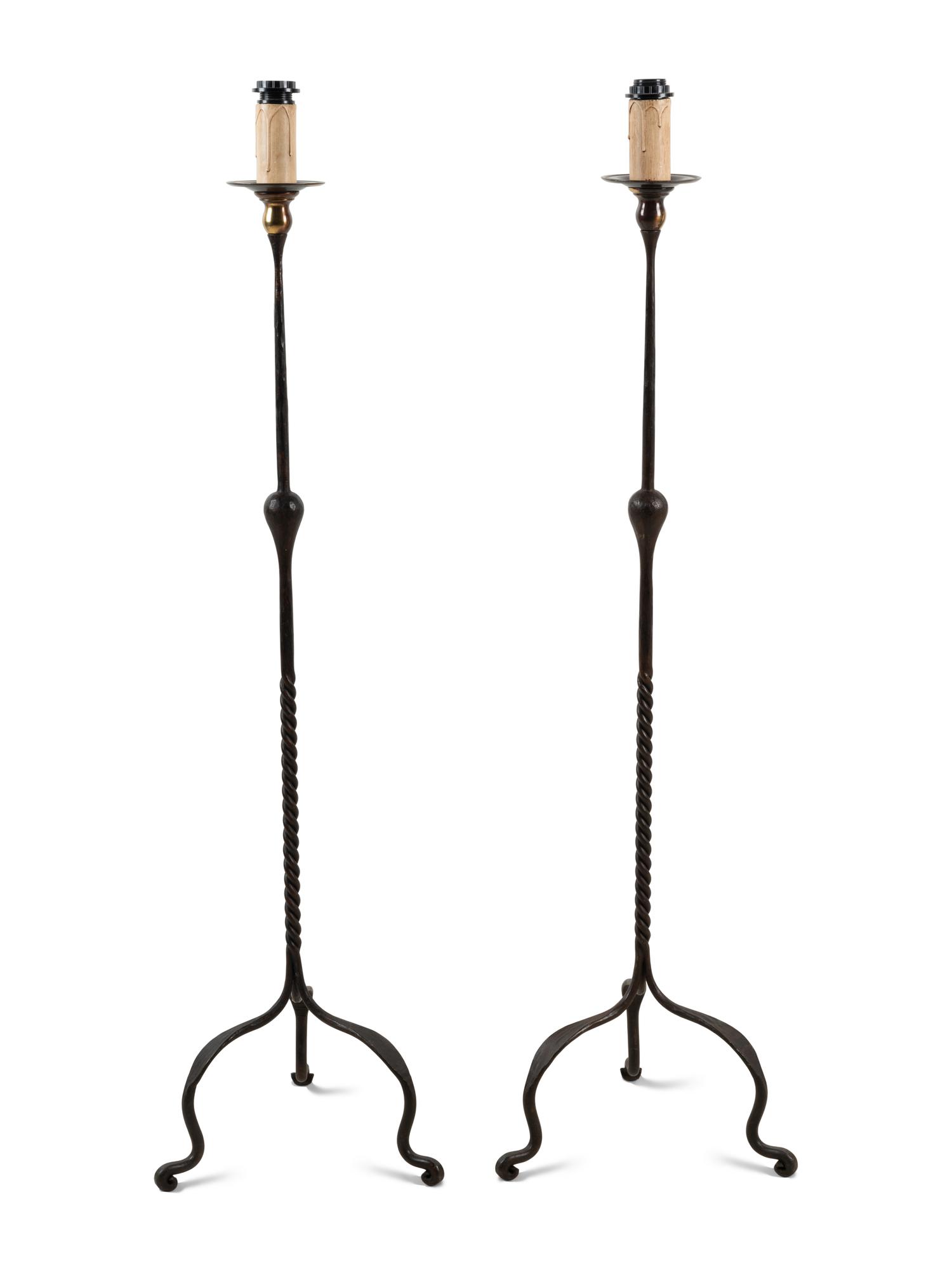 A Pair of Wrought Iron Floor Lamps