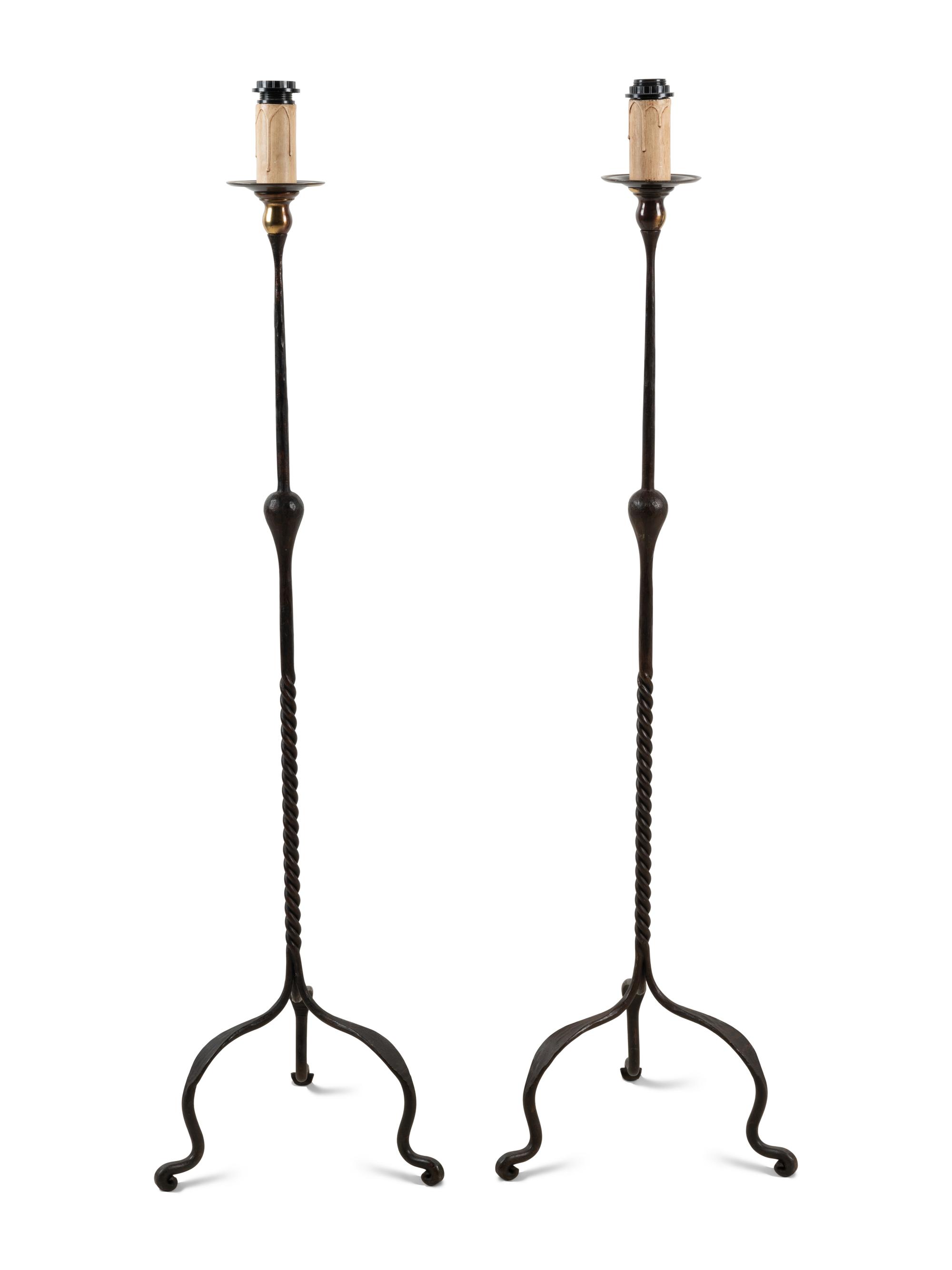 A Pair of Wrought Iron Floor Lamps