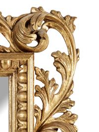 An Italian Baroque Style Giltwood Mirror