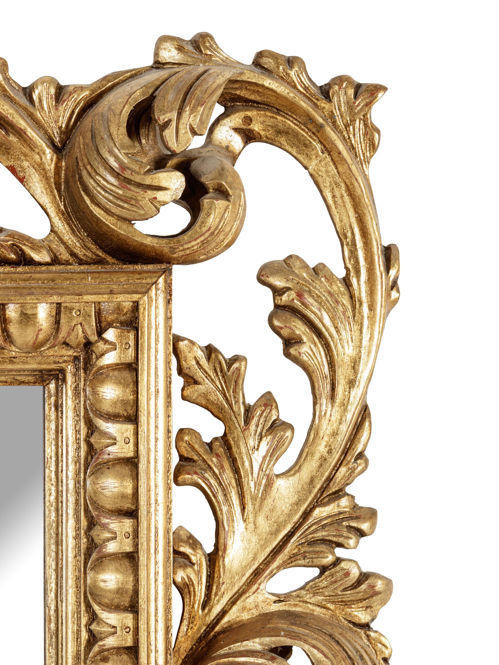 An Italian Baroque Style Giltwood Mirror