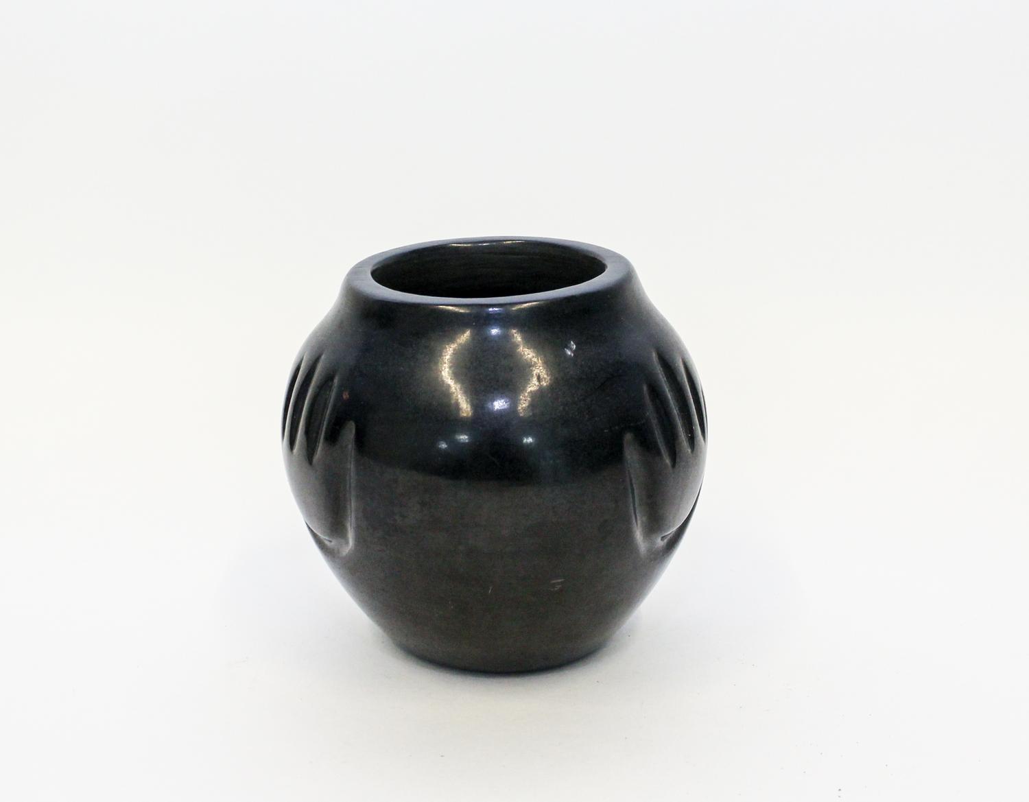 A Santa Clara Blackware Miniature Vase. Height 4 3/4 inches.