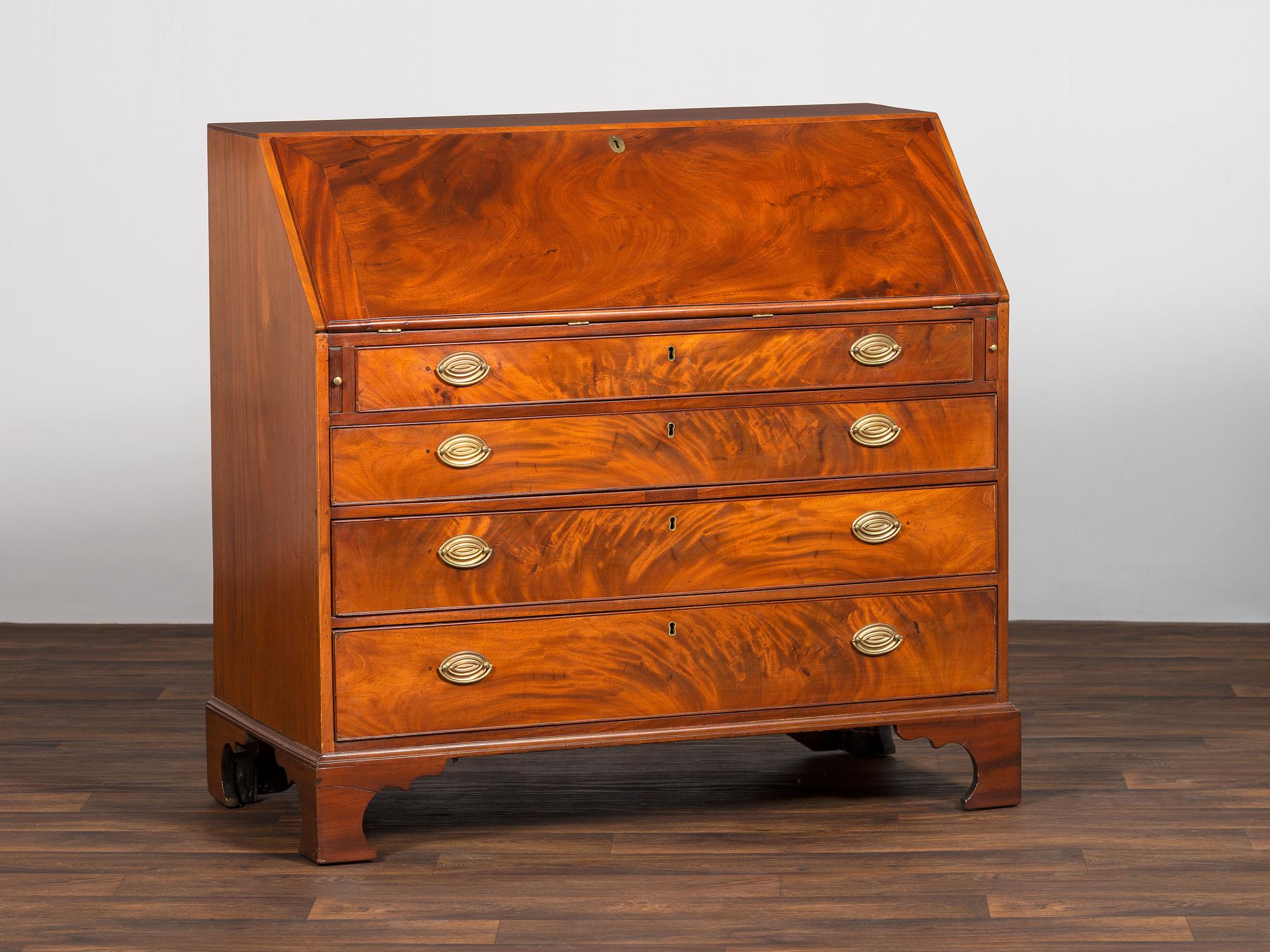 A Chippendale Figured Mahogany Slant-Front Desk