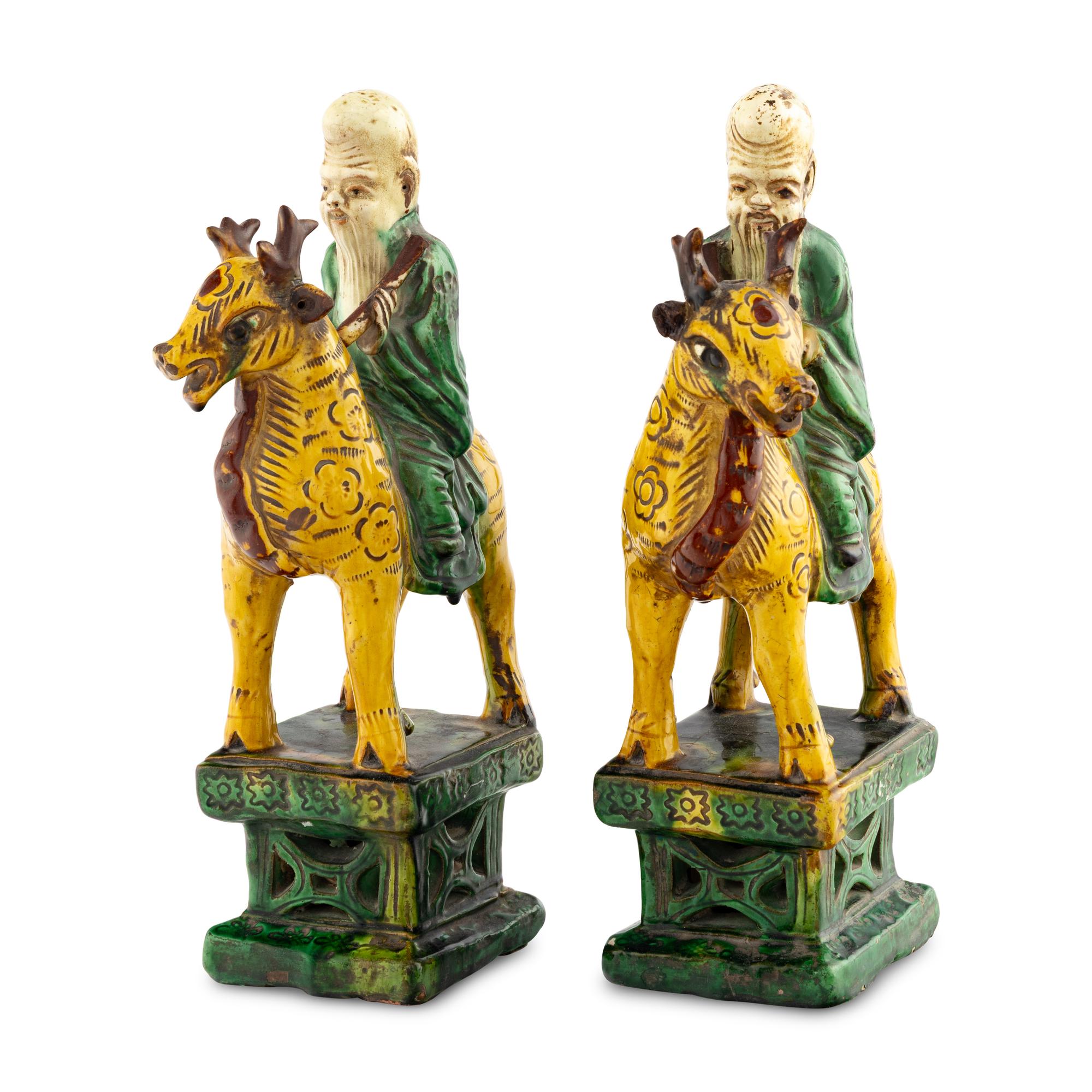 A Pair of Chinese Glazed Earthenware Figures