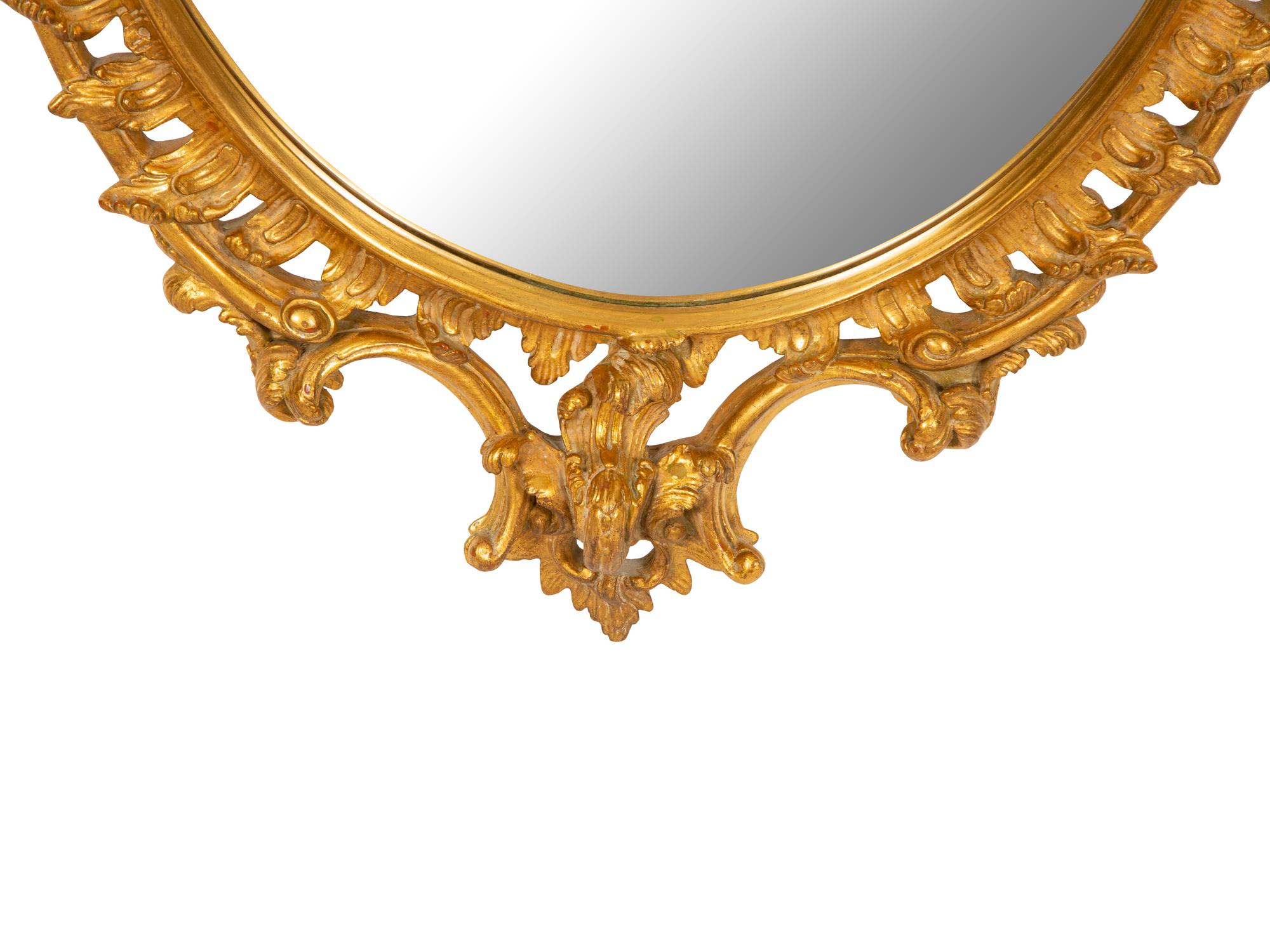 A Rococo Style Carved Giltwood Mirror