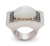 An 18 Karat White Gold, Moonstone, Black Diamond, and Diamond Ring,