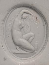 A Neoclassical Glass Intaglio with the Goddess Venus and a Carnelian Ring Stone