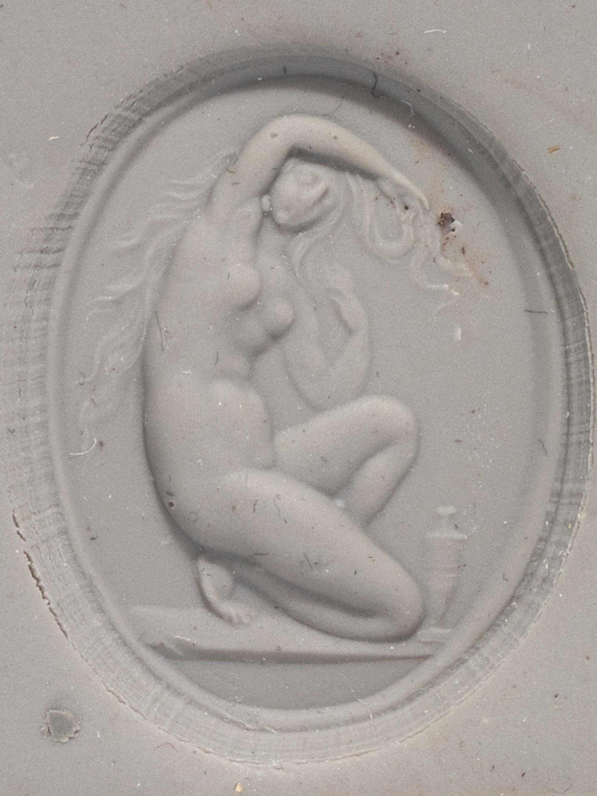 A Neoclassical Glass Intaglio with the Goddess Venus and a Carnelian Ring Stone