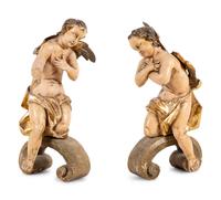 A Pair of Continental Carved, Parcel Gilt and Polychrome Painted Cherub Figures