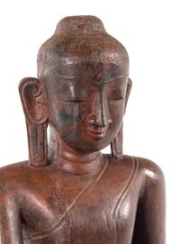 A Burmese Carved Wood Figure of Seated Buddha