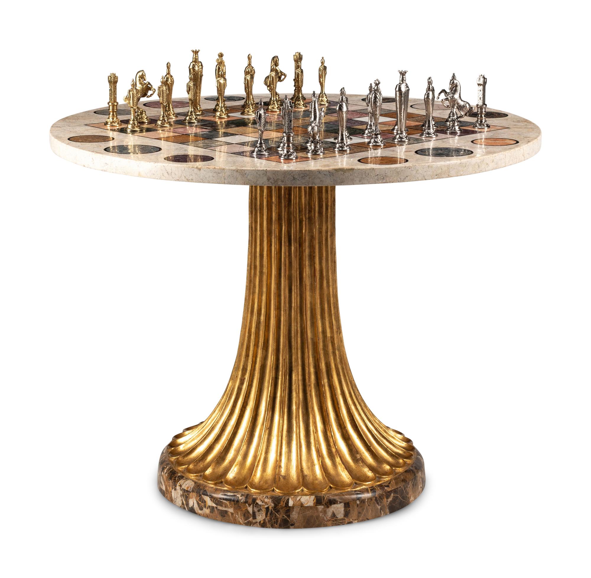 A Continental Parcel Gilt Specimen Marble Game Table