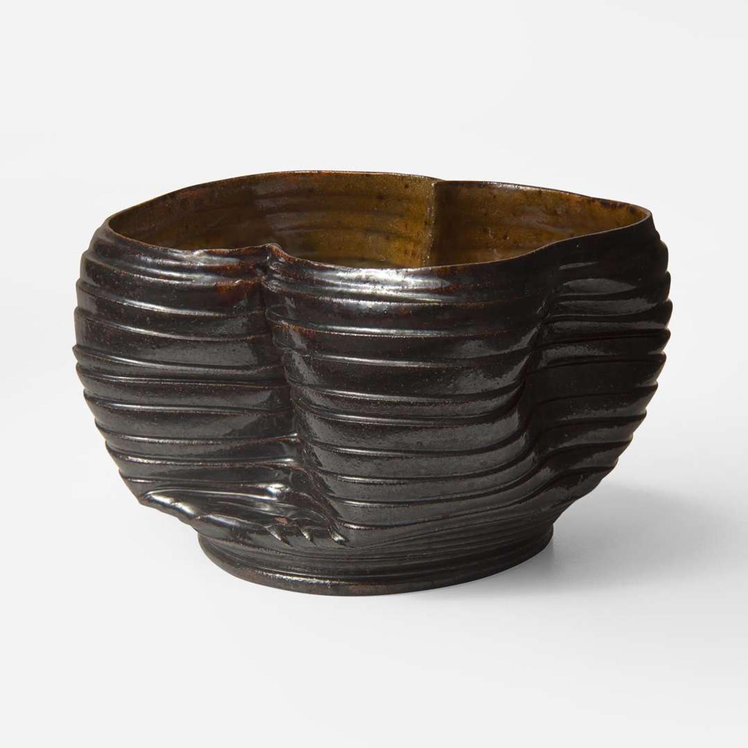 George Ohr (American, 1857-1918) Ribbed and Folded Vessel in Brown and Speckled Ochre Glaze, Biloxi, Mississippi, USA, circa 1897-1900