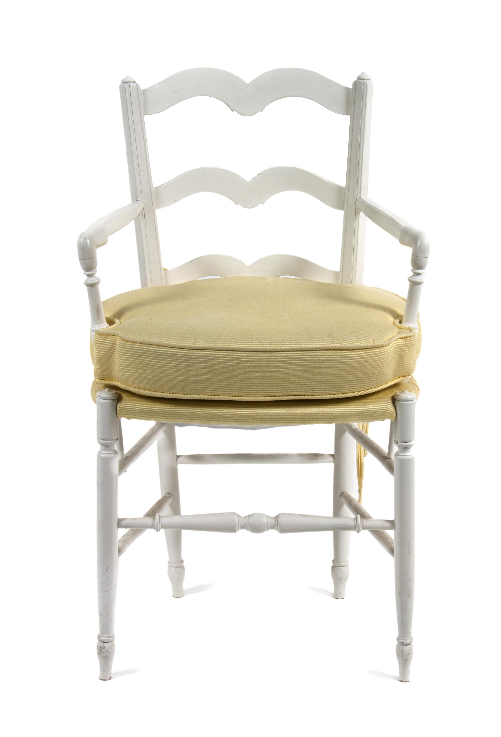 A White Painted Open Armchair Height 23 x width 17 x depth 37 inches.