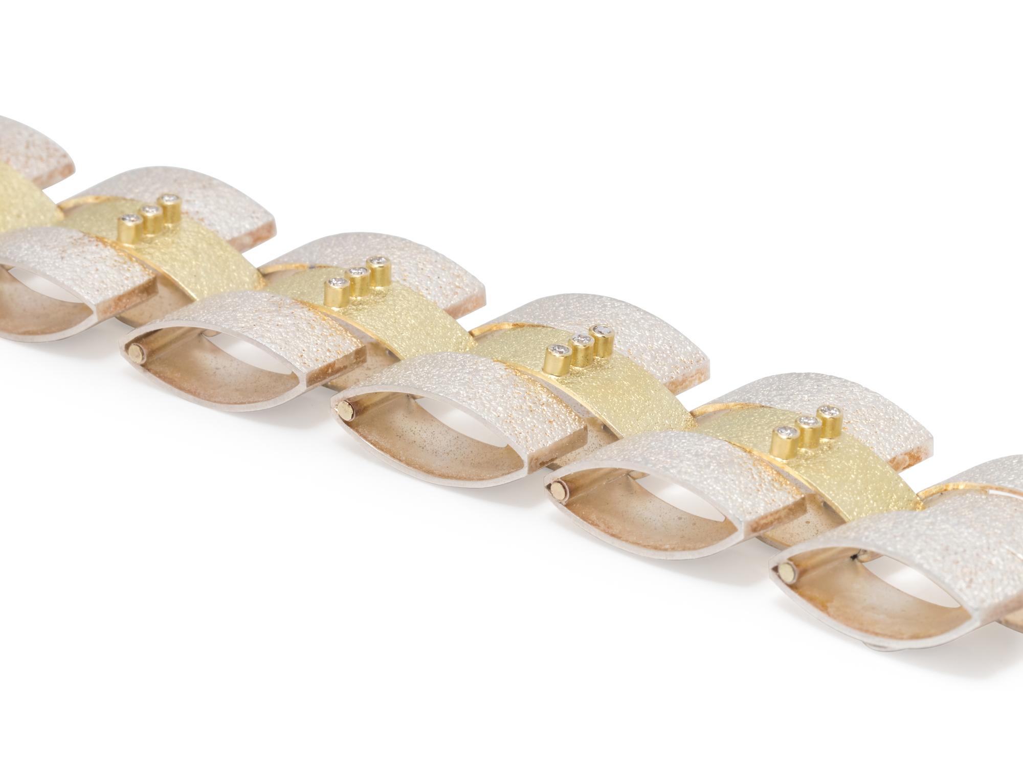 YELLOW GOLD, STERLING SILVER AND DIAMOND BRACELET