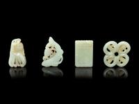 Four Chinese Pale Celadon Jade Pendants