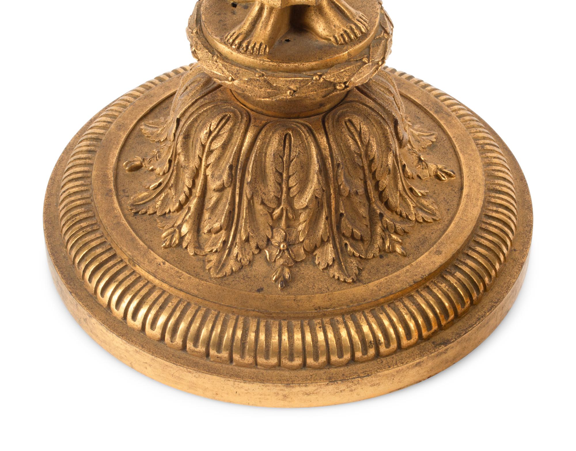 A Pair of Charles X Gilt Bronze Candlesticks