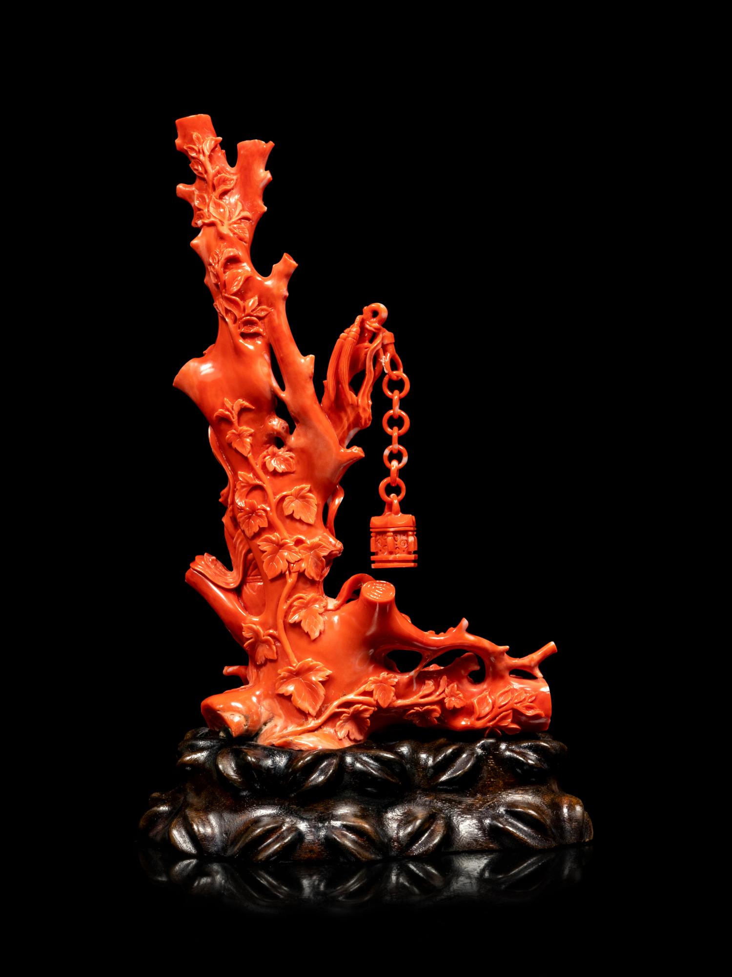 A Carved Red Coral Figure of a Female Immortal