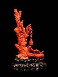 A Carved Red Coral Figure of a Female Immortal