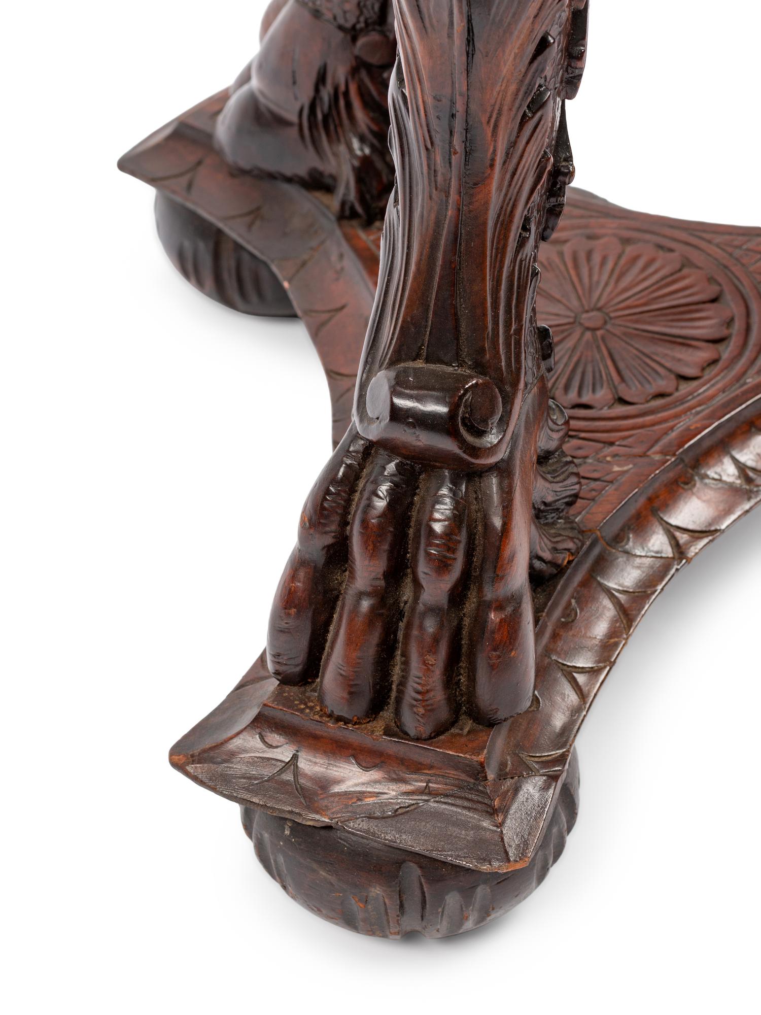 A Continental Carved Wood Jardinière and Fifteen Marble Ornaments