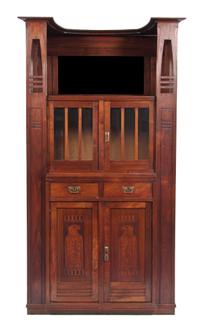 An English Arts & Crafts Walnut Cabinet, Height 77 7/8 x width 39 1/4 x depth 19 1/2 inches.