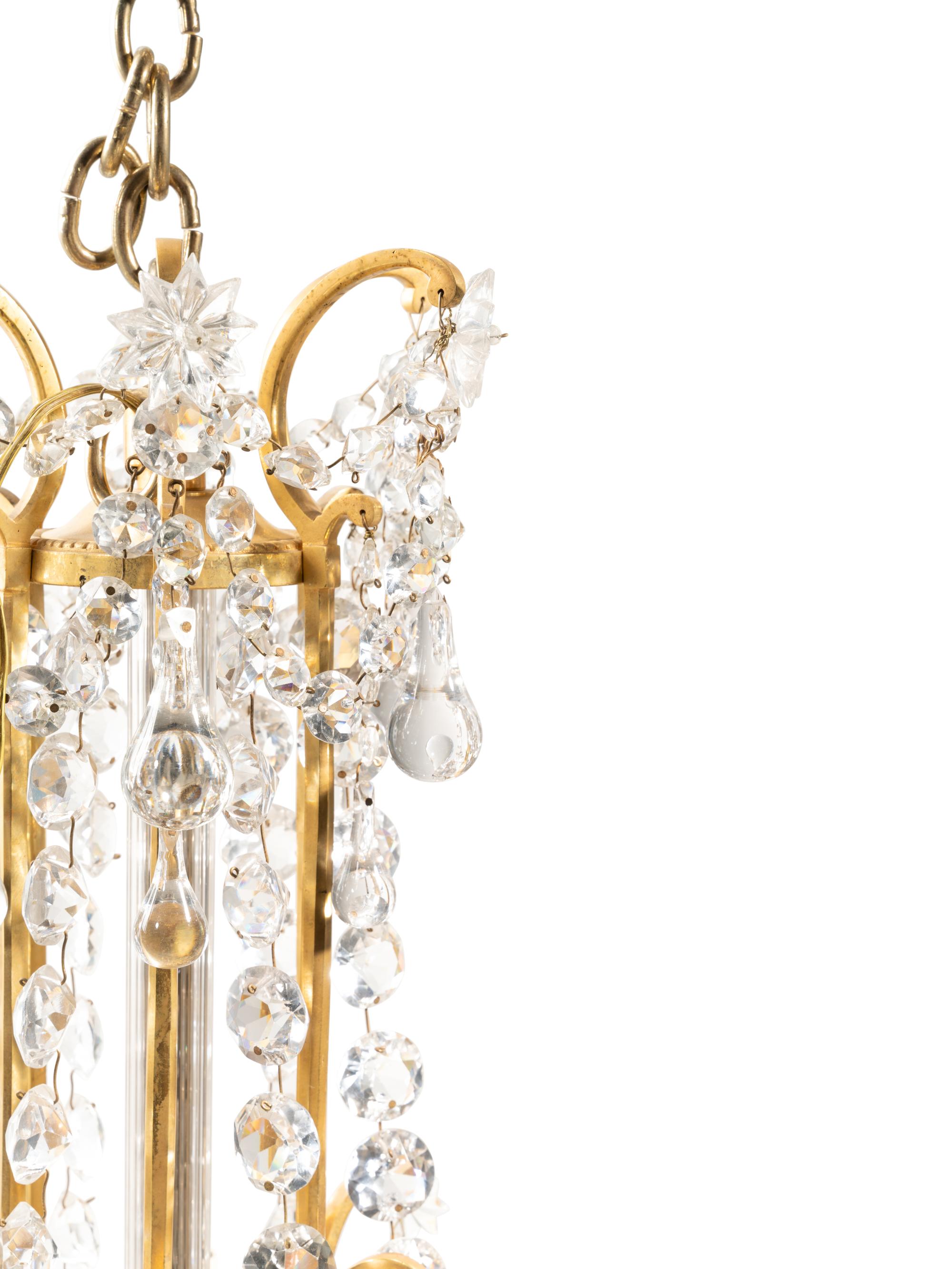 A French Gilt Bronze and Cut Glass Eighteen-Light Chandelier Attributed to Baccarat