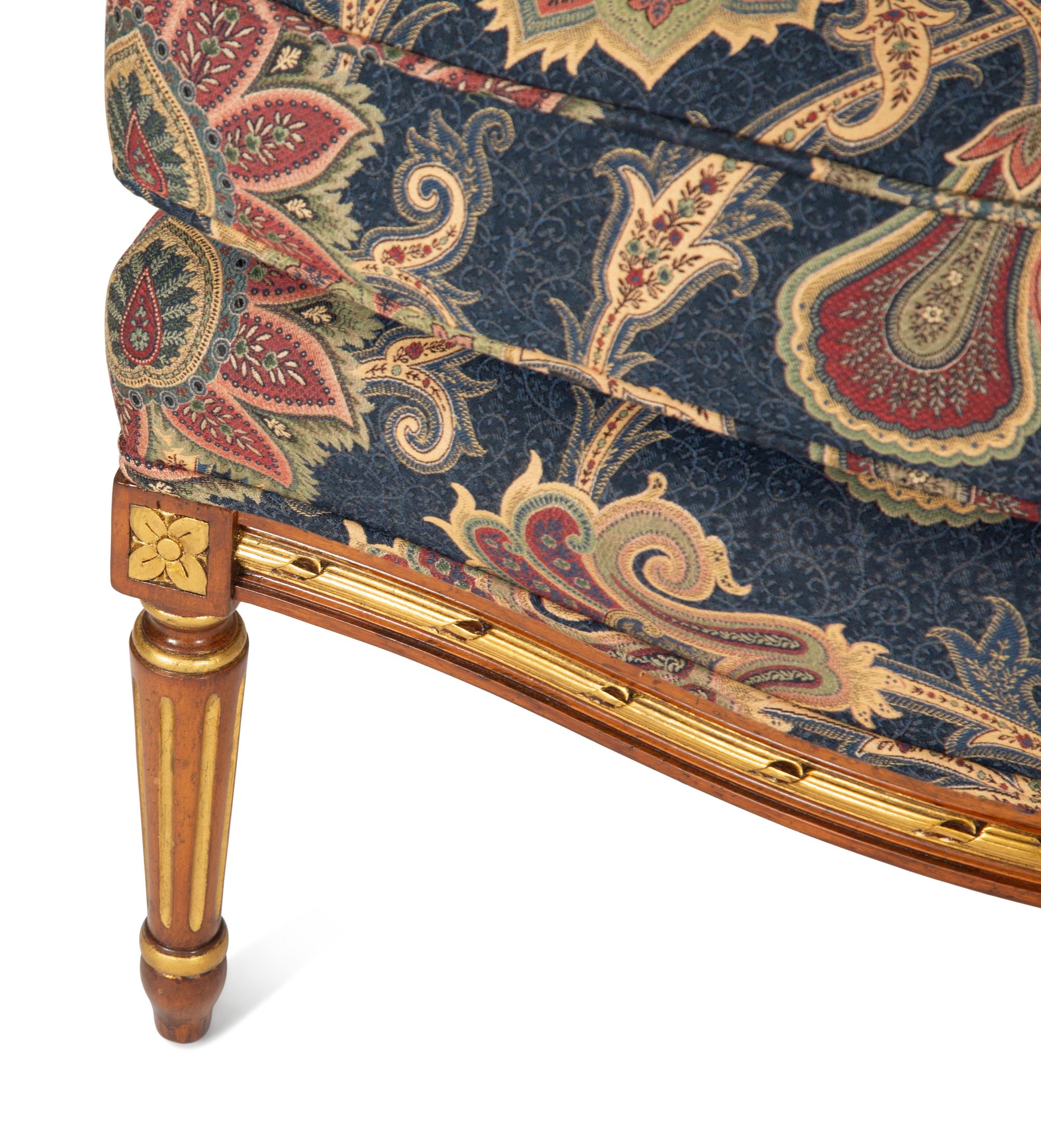 A Pair of Louis XVI Style Parcel Gilt Fruitwood Bergères