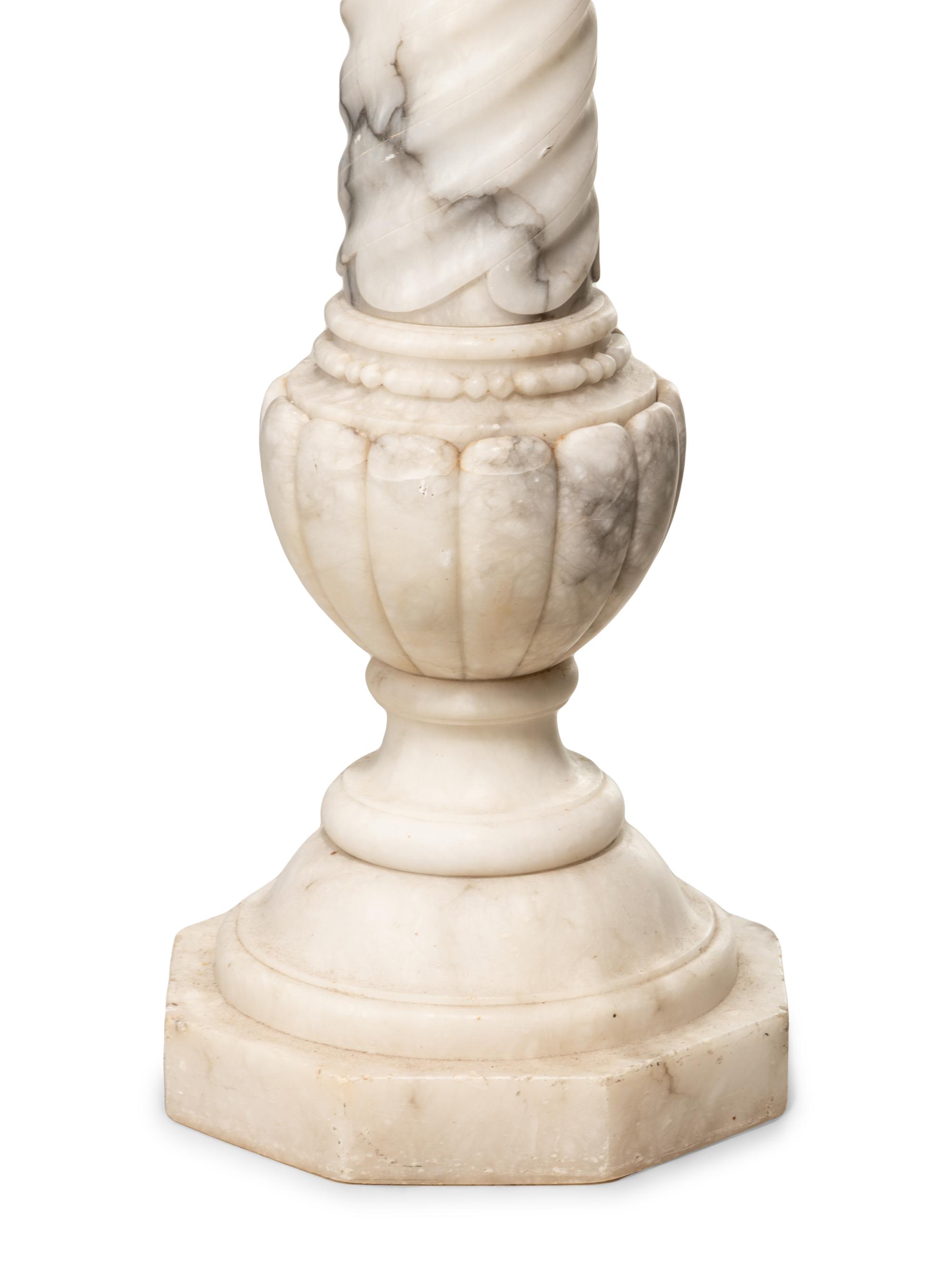 A Continental Carved Marble Pedestal