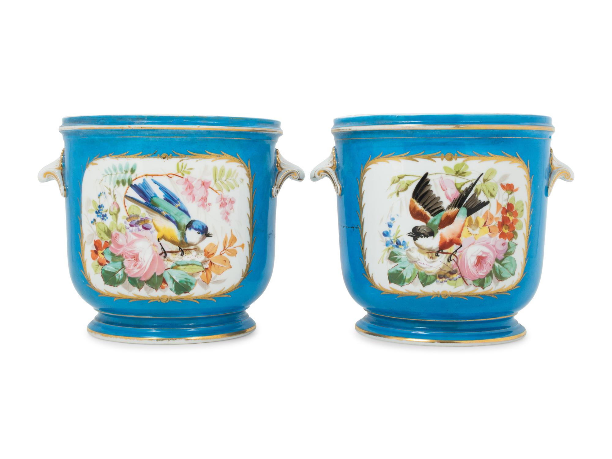 A Pair of Sèvres Style Porcelain Cache Pots