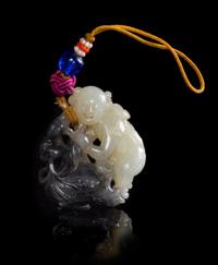 A Black and White Jade Toggle Height 1 3/4 inches.