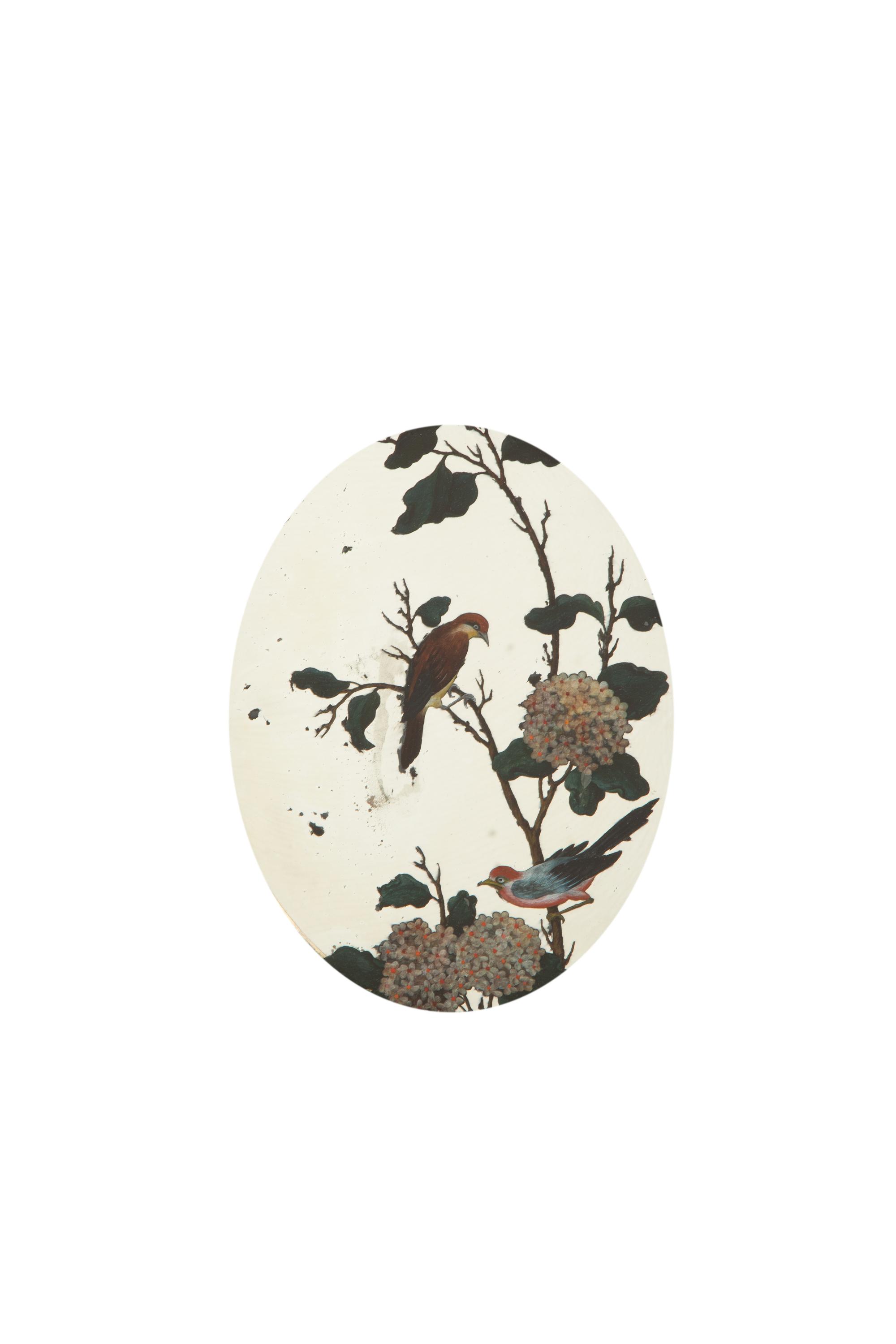 A Pair of George III Giltwood and Reverse-Painted Mirror Wall Appliques
