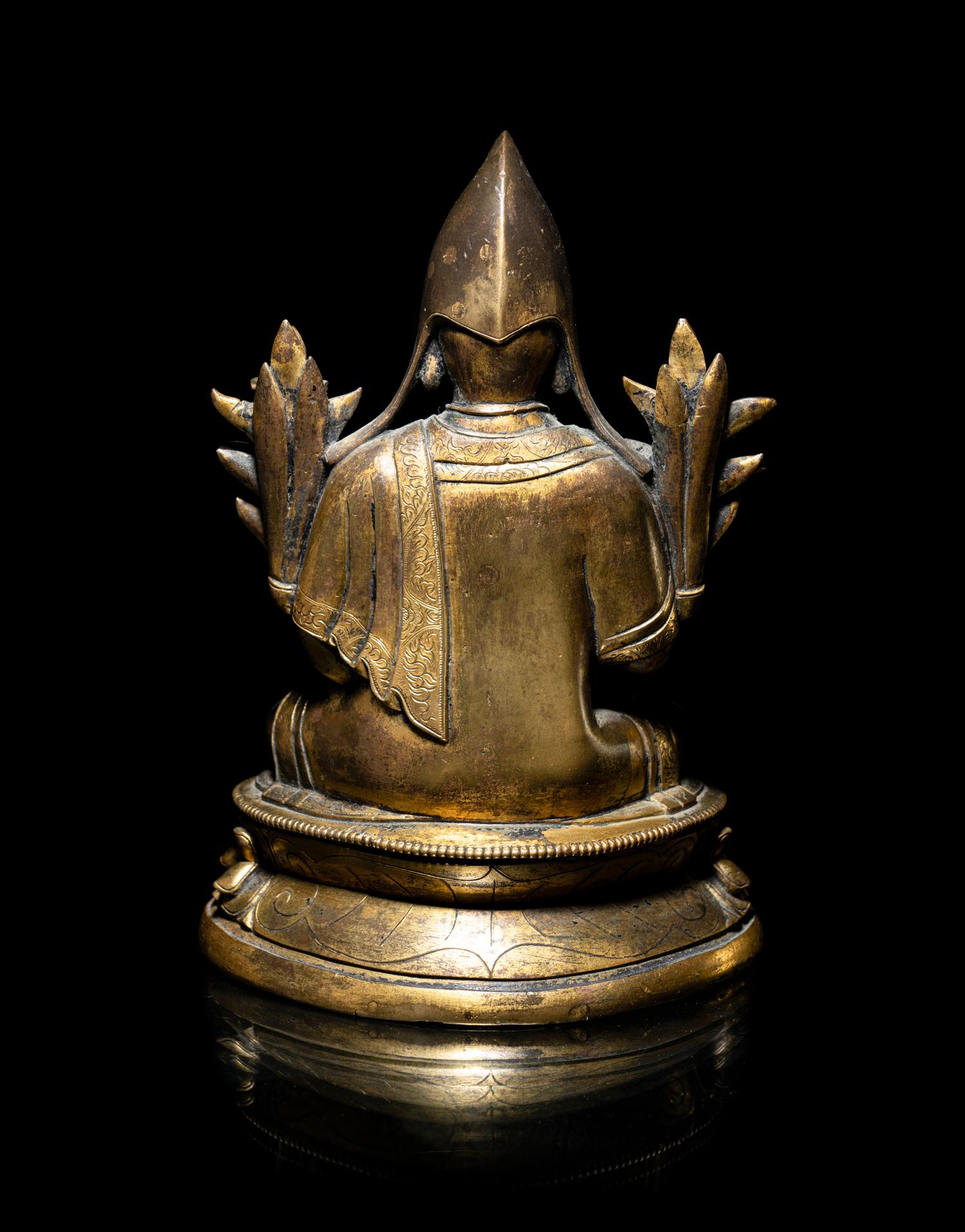A Tibetan Parcel-Gilt Bronze Figure of Tsongkapa
