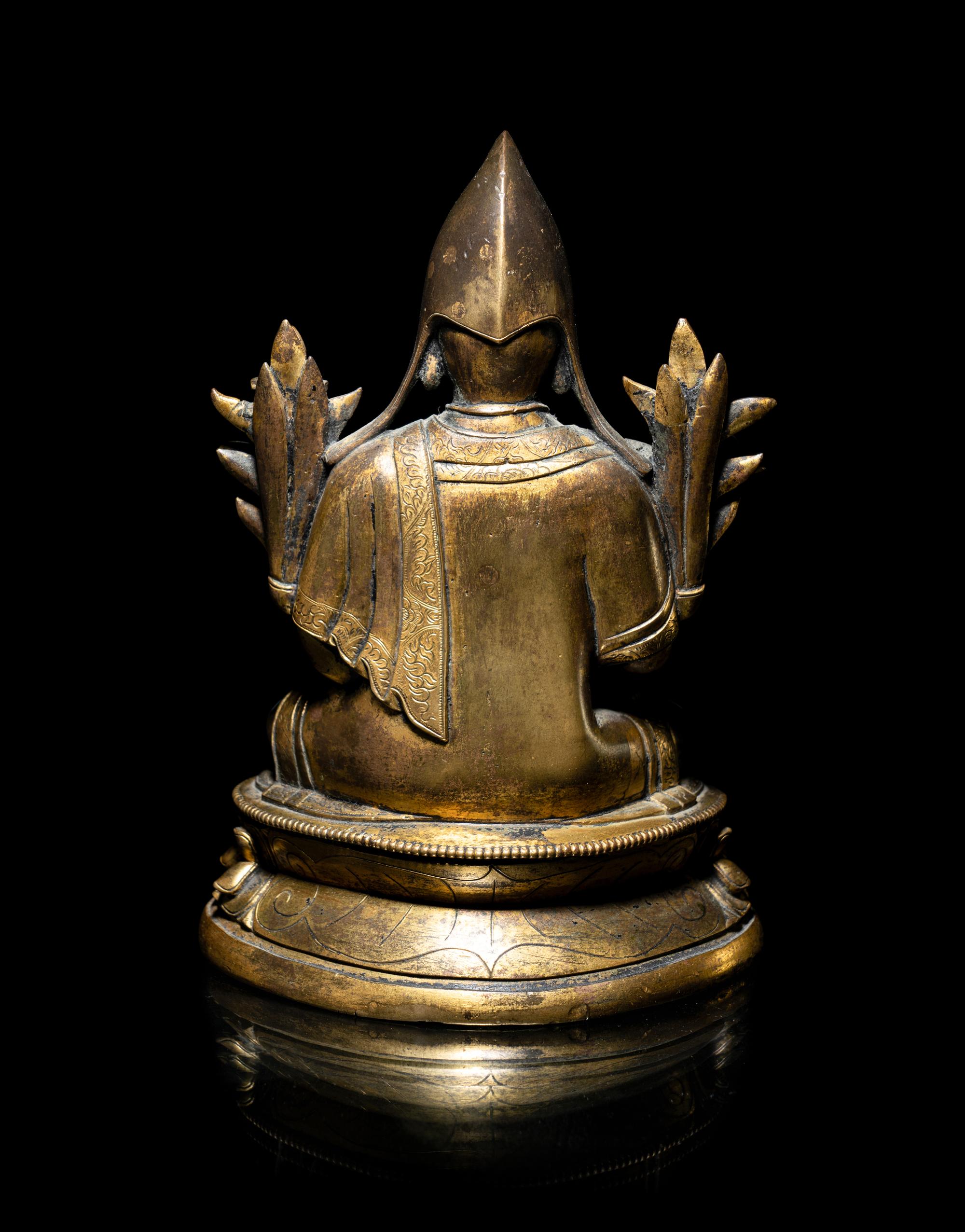 A Tibetan Parcel-Gilt Bronze Figure of Tsongkapa