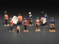 A Collection of Folk Art Carved and Painted 'English Parade' Figures