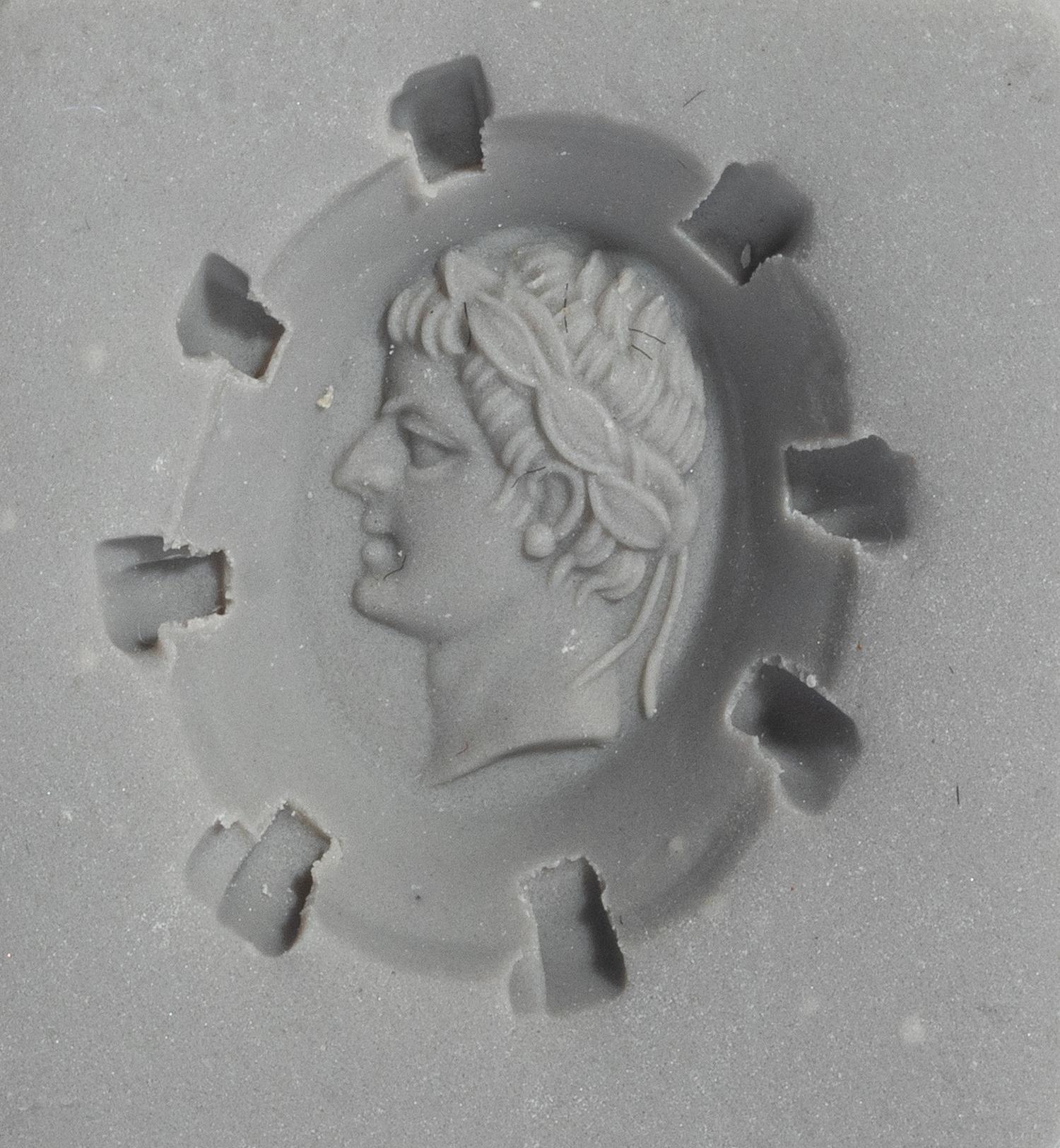 A Neoclassical Gold and Banded Agate Finger Ring with a Male Portrait Head