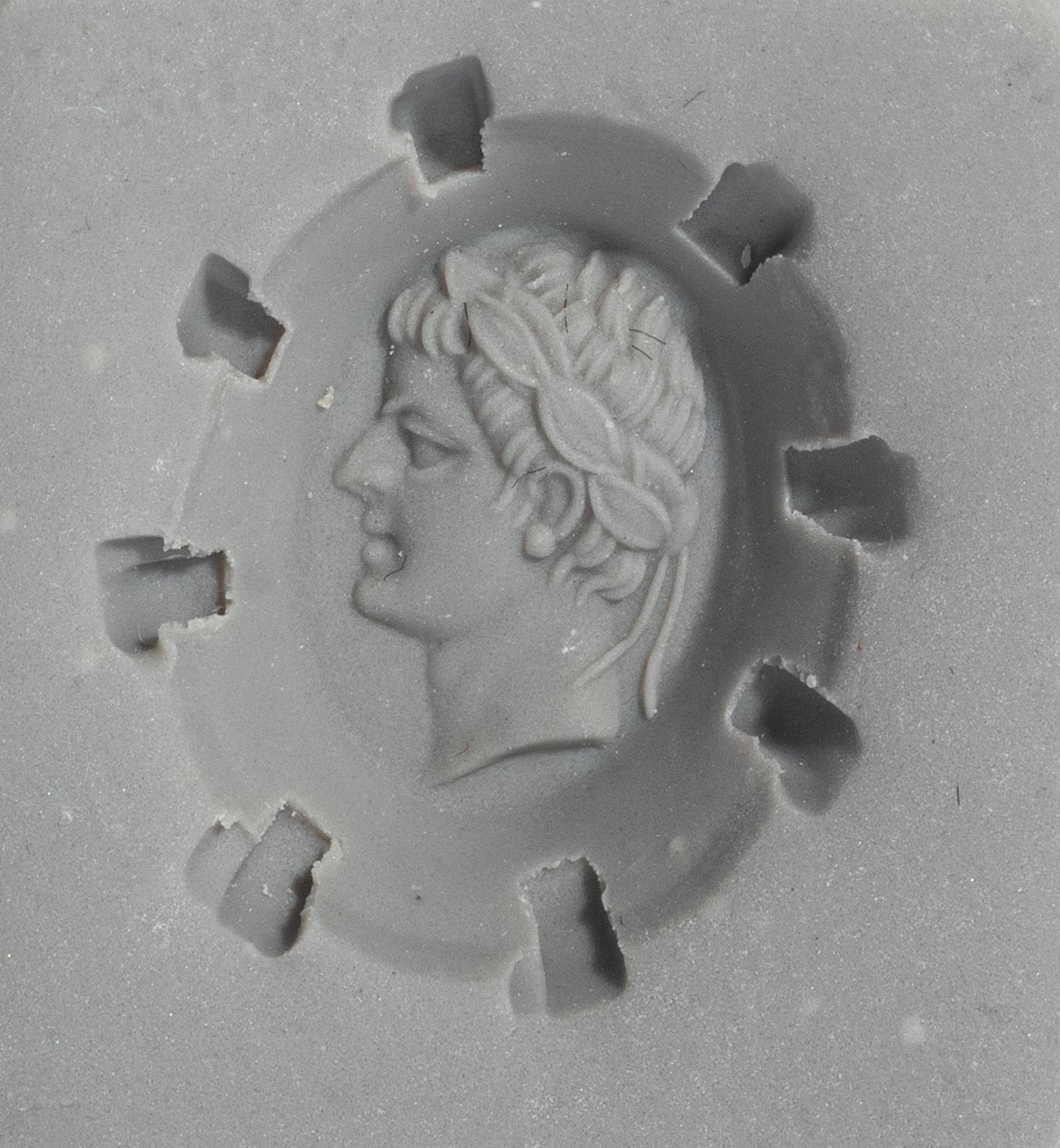 A Neoclassical Gold and Banded Agate Finger Ring with a Male Portrait Head